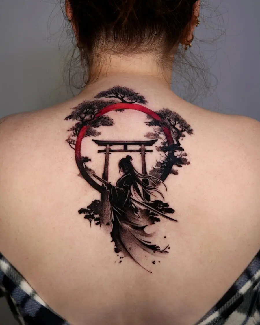 Elegant Japanese silhouette tattoo featuring a torii gate