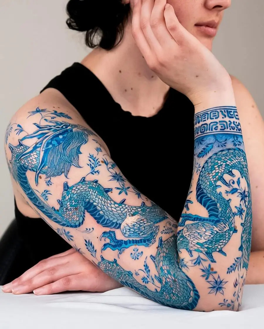 Elegant Japanese dragon tattoo with floral details