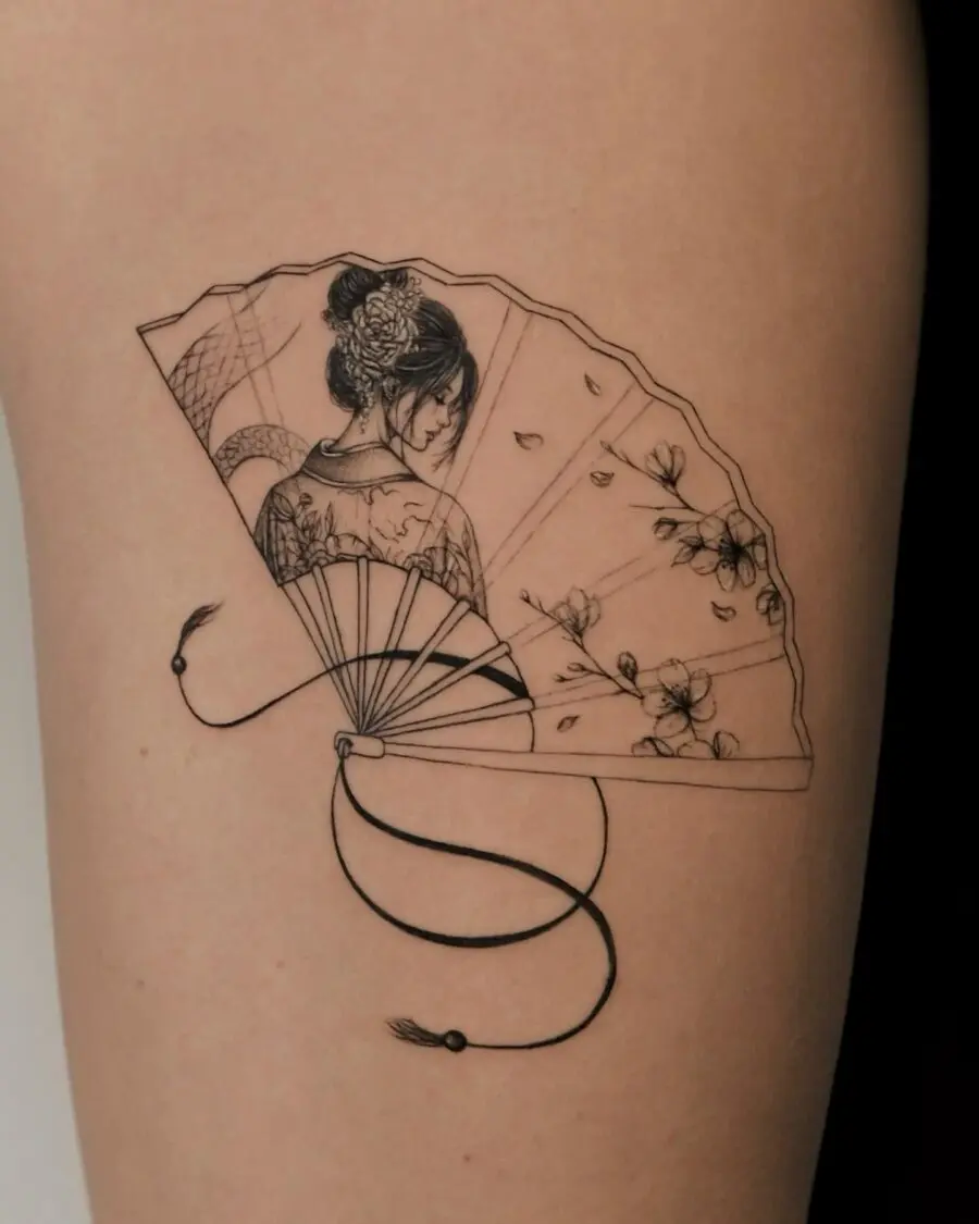 Delicate fan tattoo with elegant woman silhouette