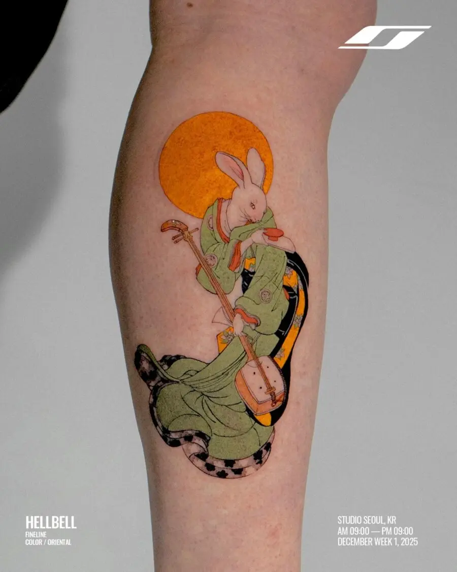 Elegant rabbit and snake tattoo in vibrant colors