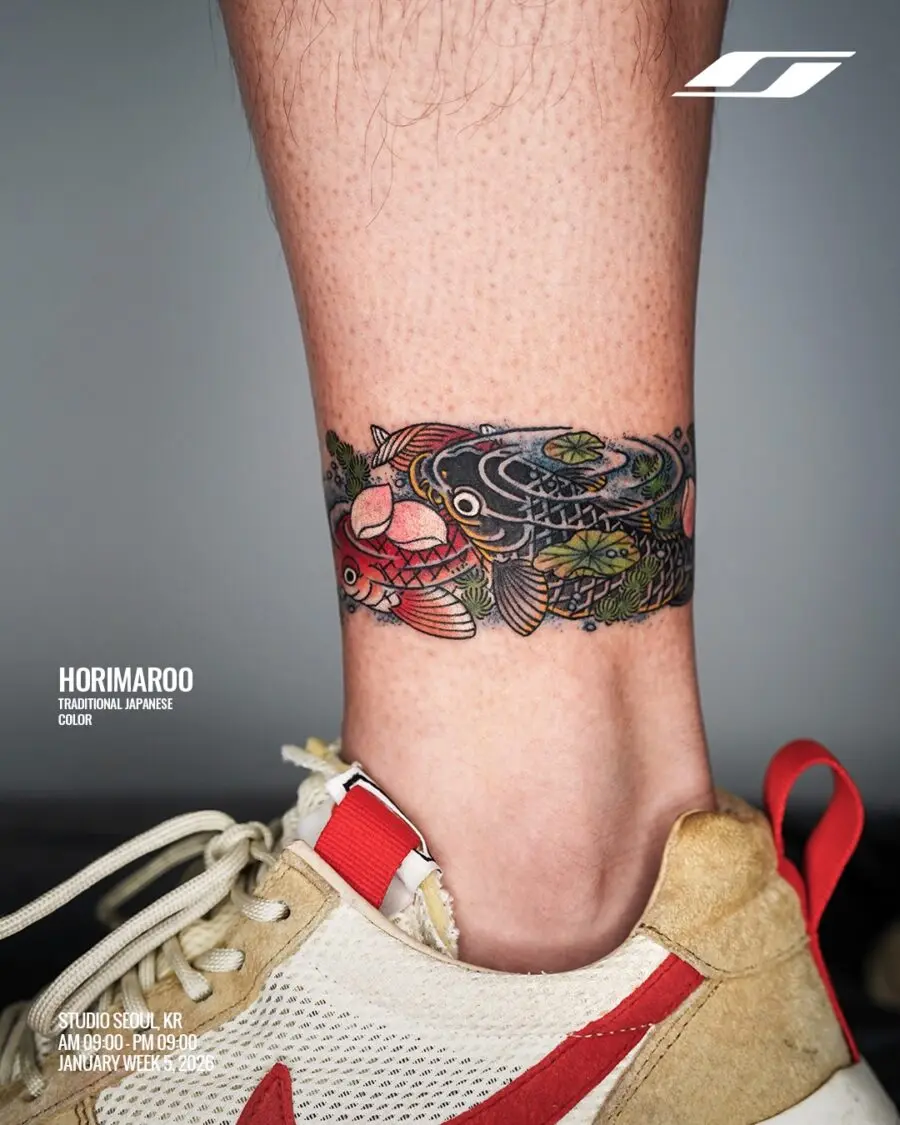 Vibrant Japanese tattoo featuring koi and nature
