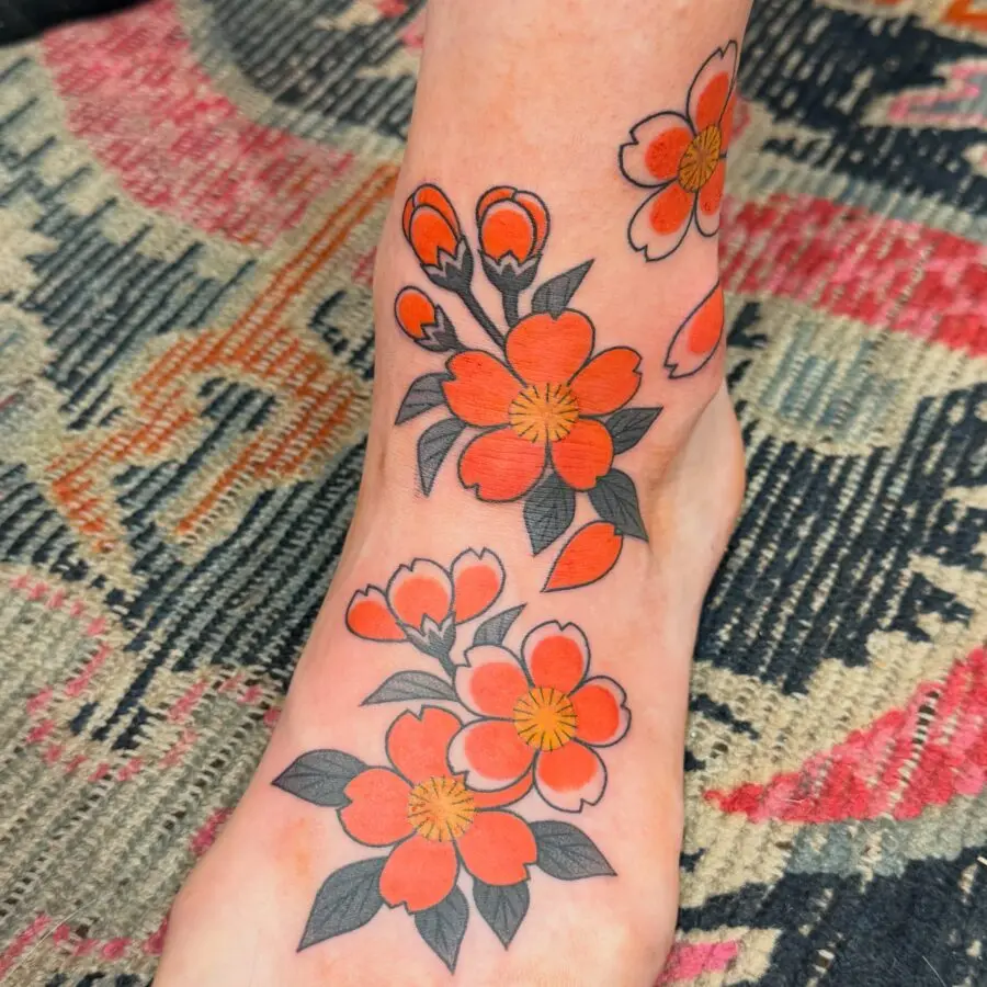 Vibrant Cherry Blossom Ankle Tattoo Design