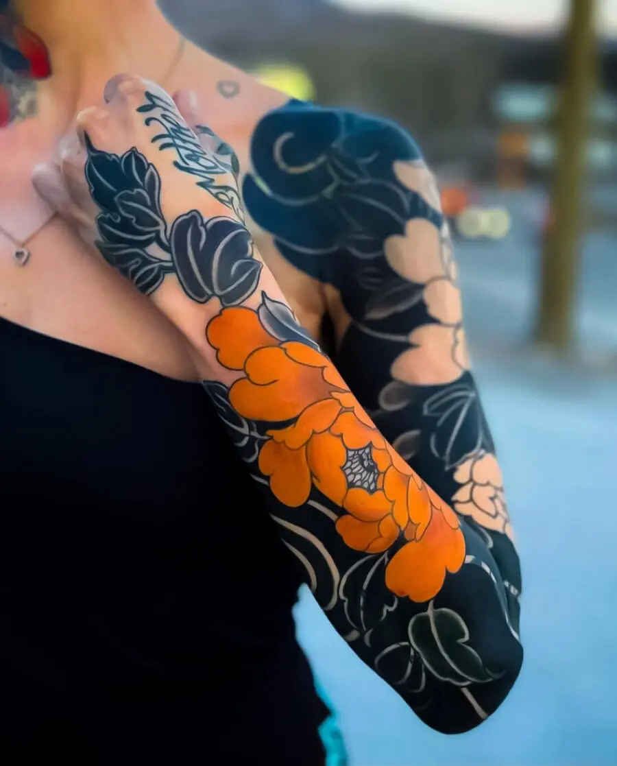Vibrant Japanese Flower Tattoo Sleeve Design