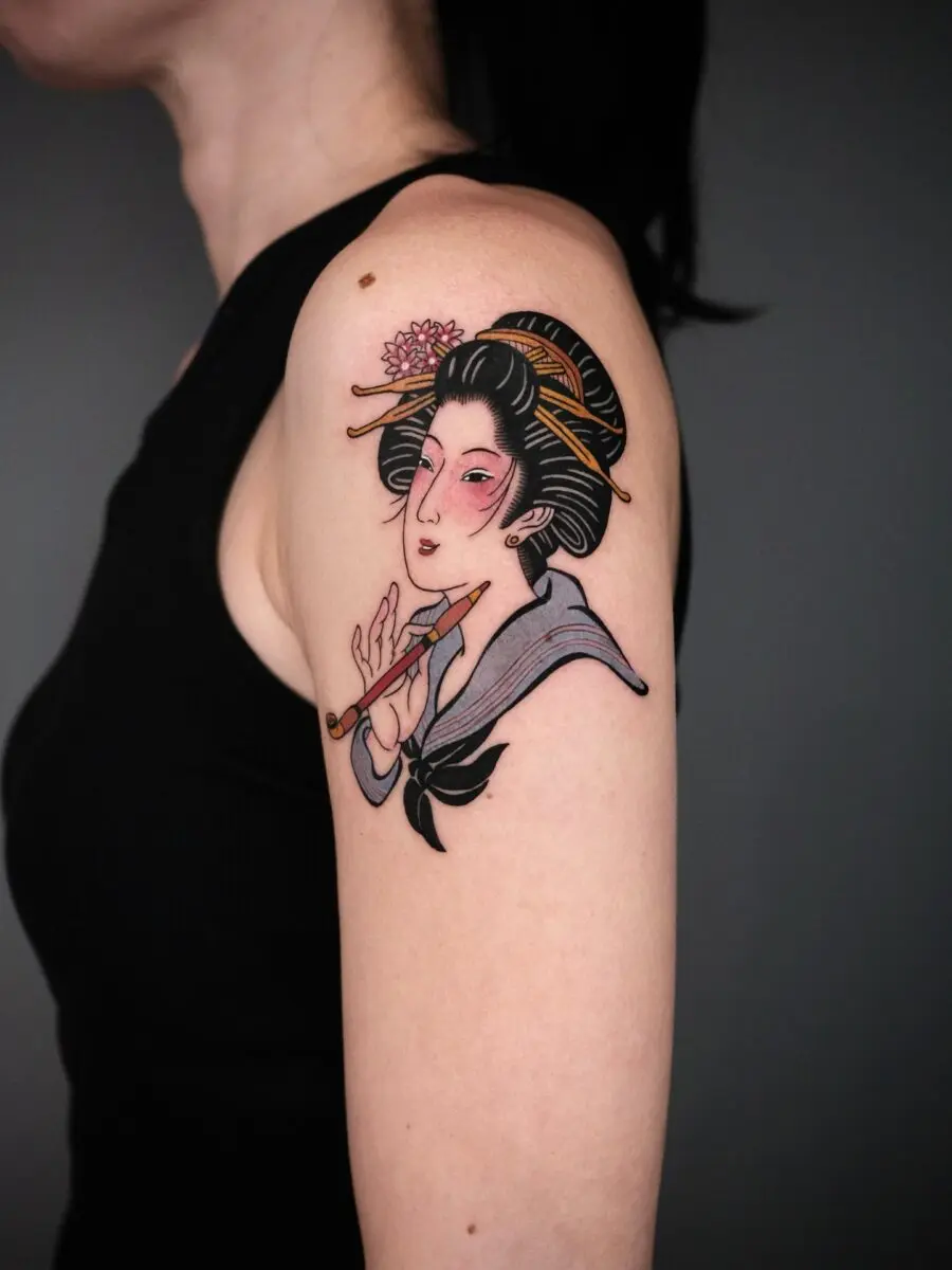 Graceful geisha with a flute tattoo design