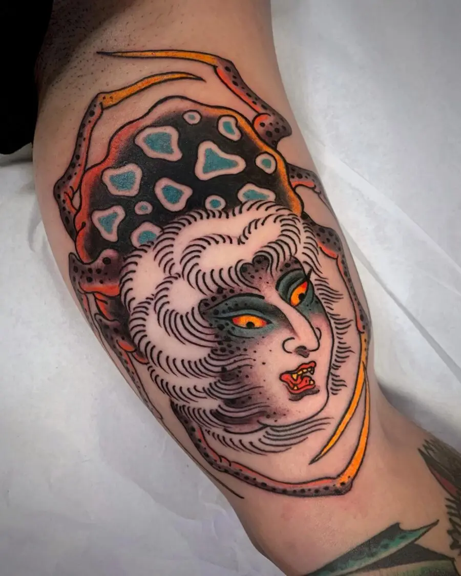 Intricate Japanese tattoo featuring Hannya mask