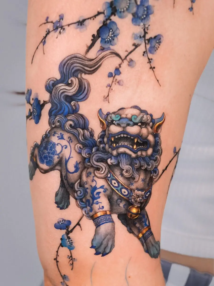 Vibrant lion dog tattoo with blooming flowers