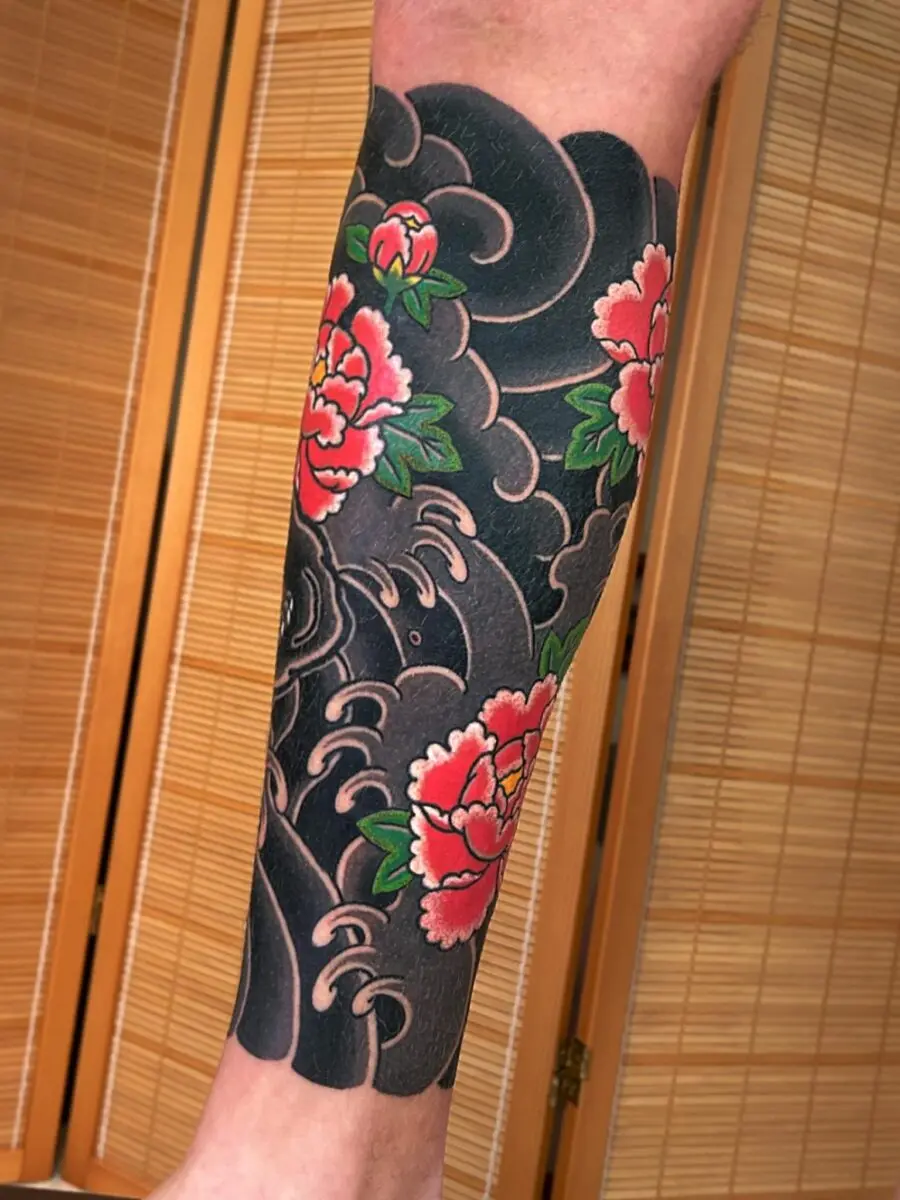 Vibrant Japanese Peony and Wave Tattoo Design