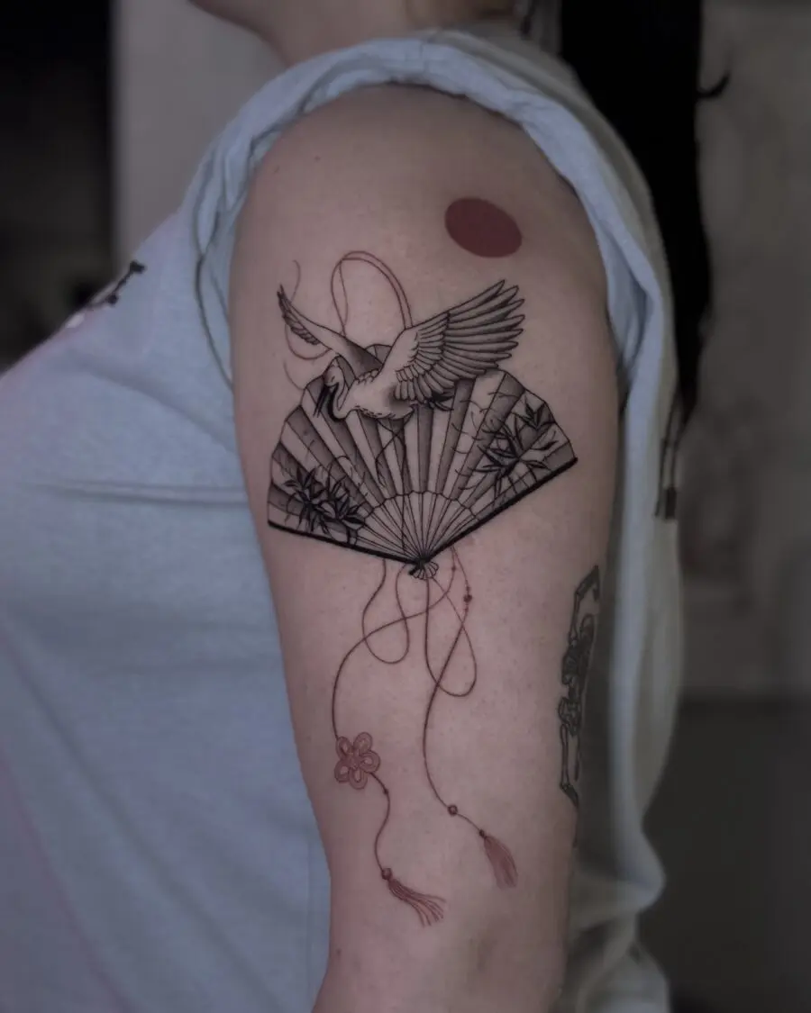 Elegant swan tattoo with traditional elements