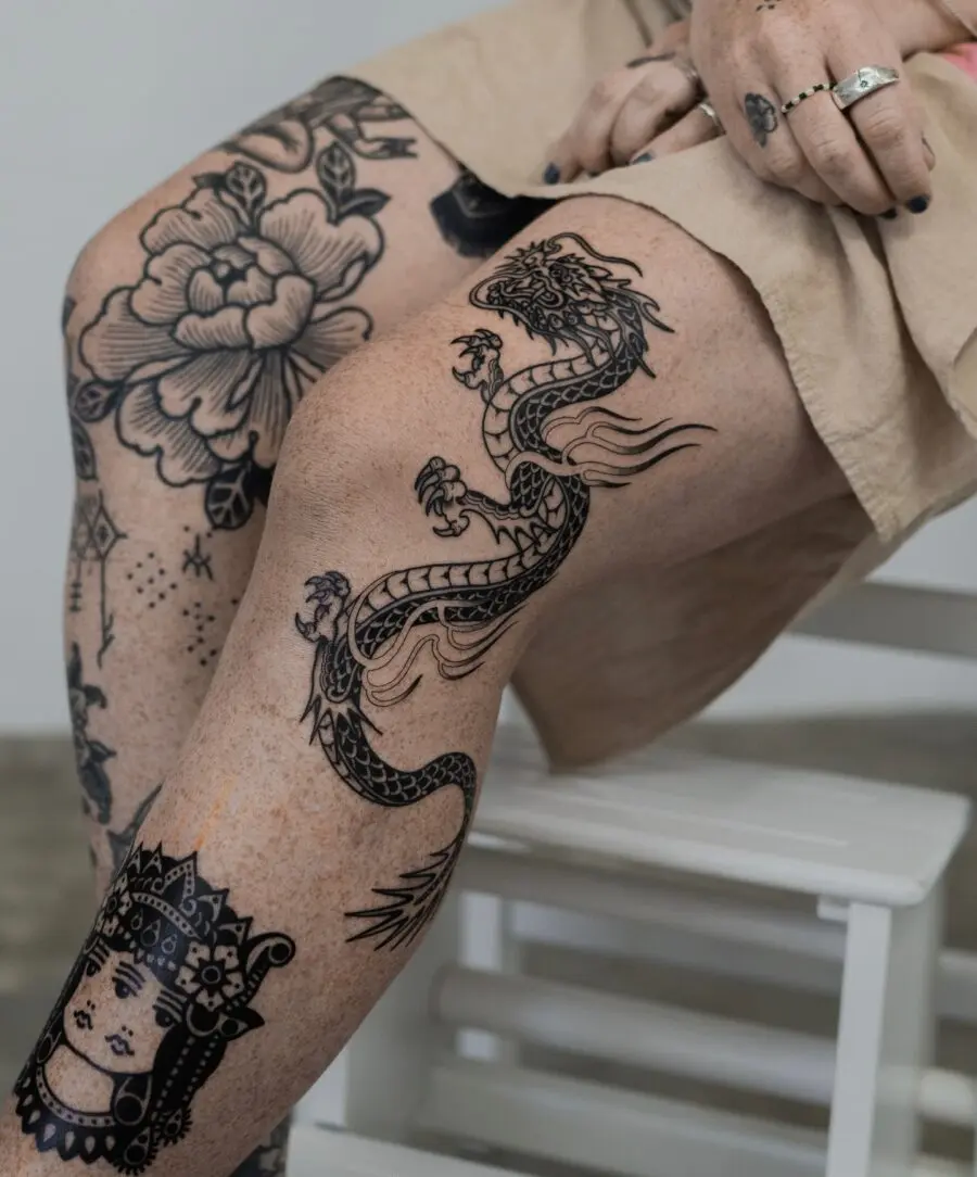 Stunning Japanese dragon tattoo on kneecap