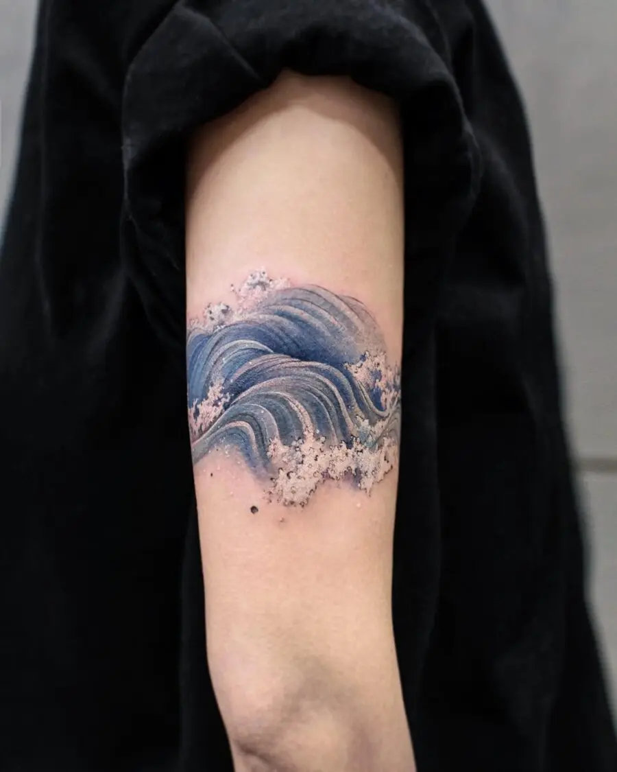 Captivating Ocean Waves in Tattoo Art