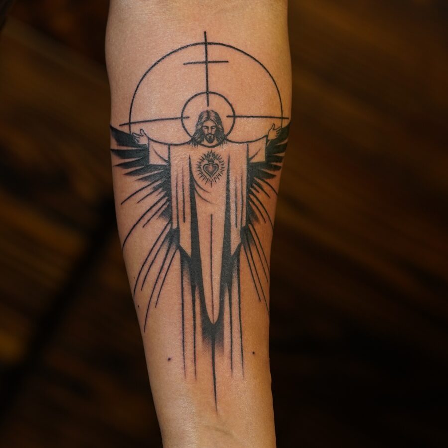 Divine representation of Jesus Christ in tattoo