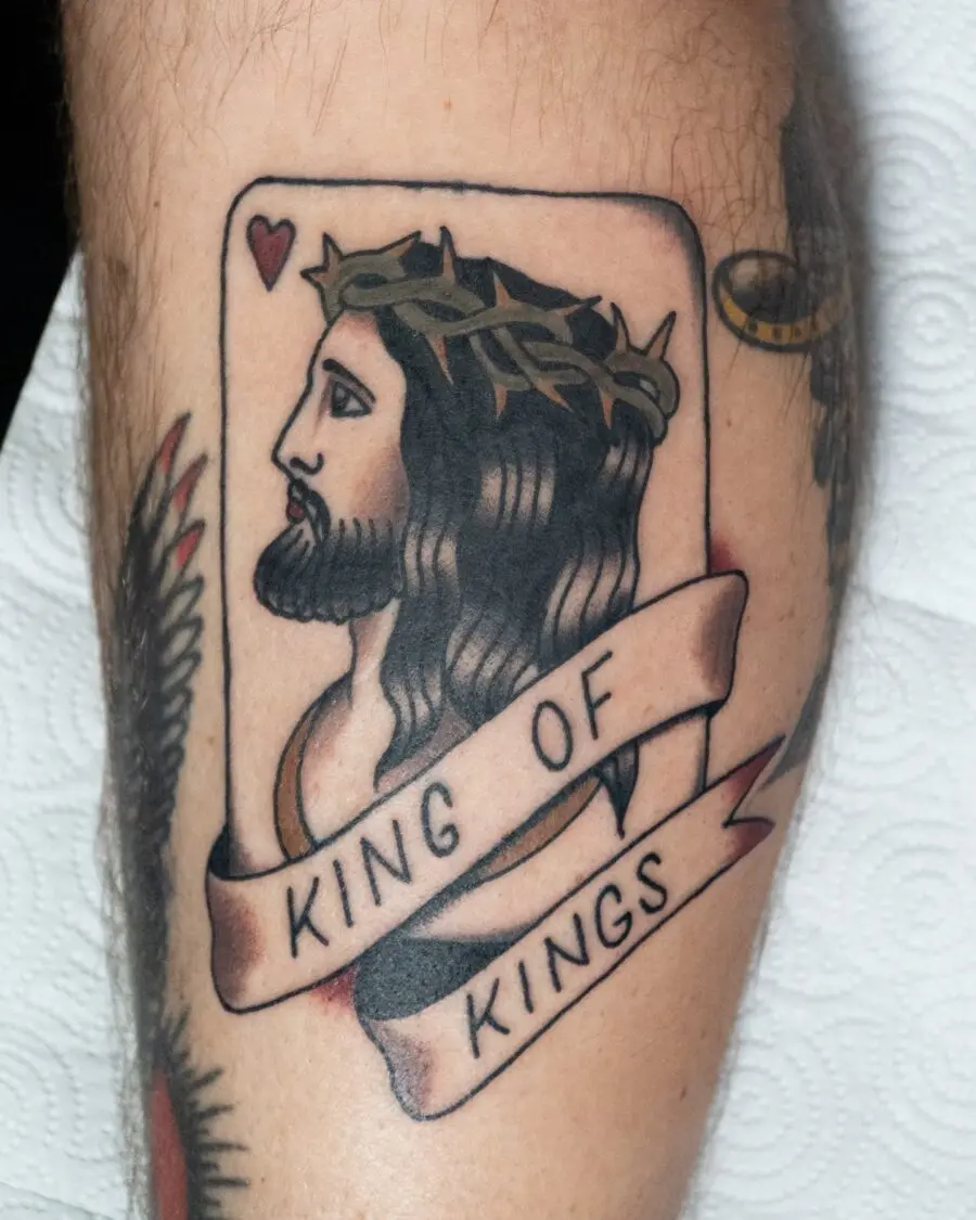 Symbolic tattoo of Jesus with crown
