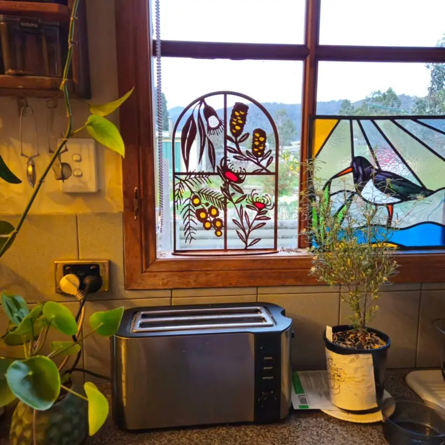 Charming kitchen with vibrant stained glass decor