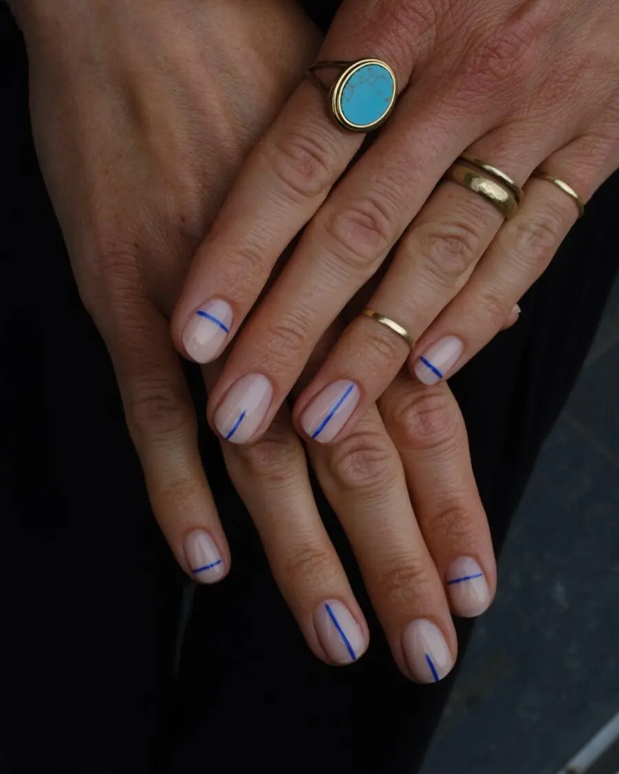 Elegant minimalist nails with chic blue accents