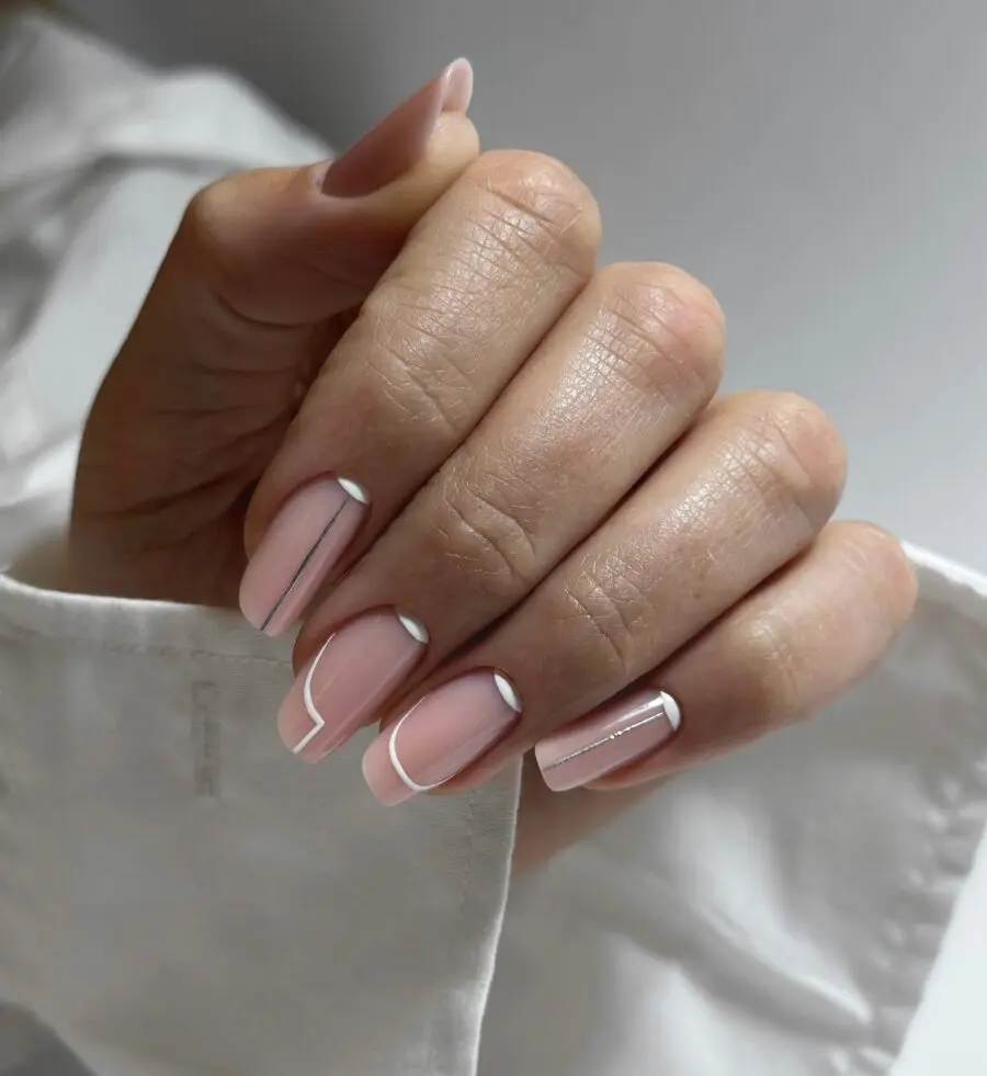 Sophisticated minimalist nail design in soft pink