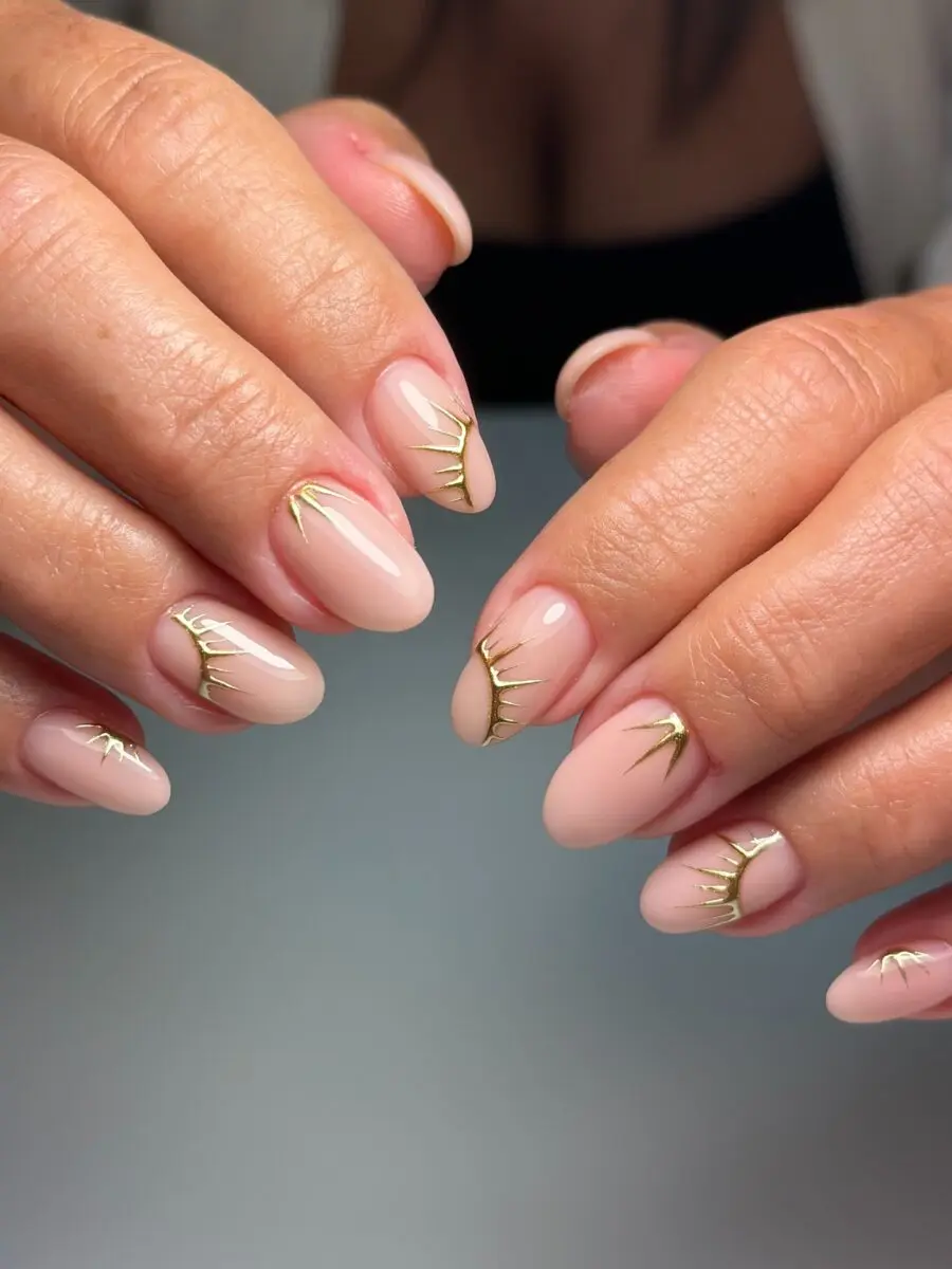 Elegant minimalist nails with golden accents