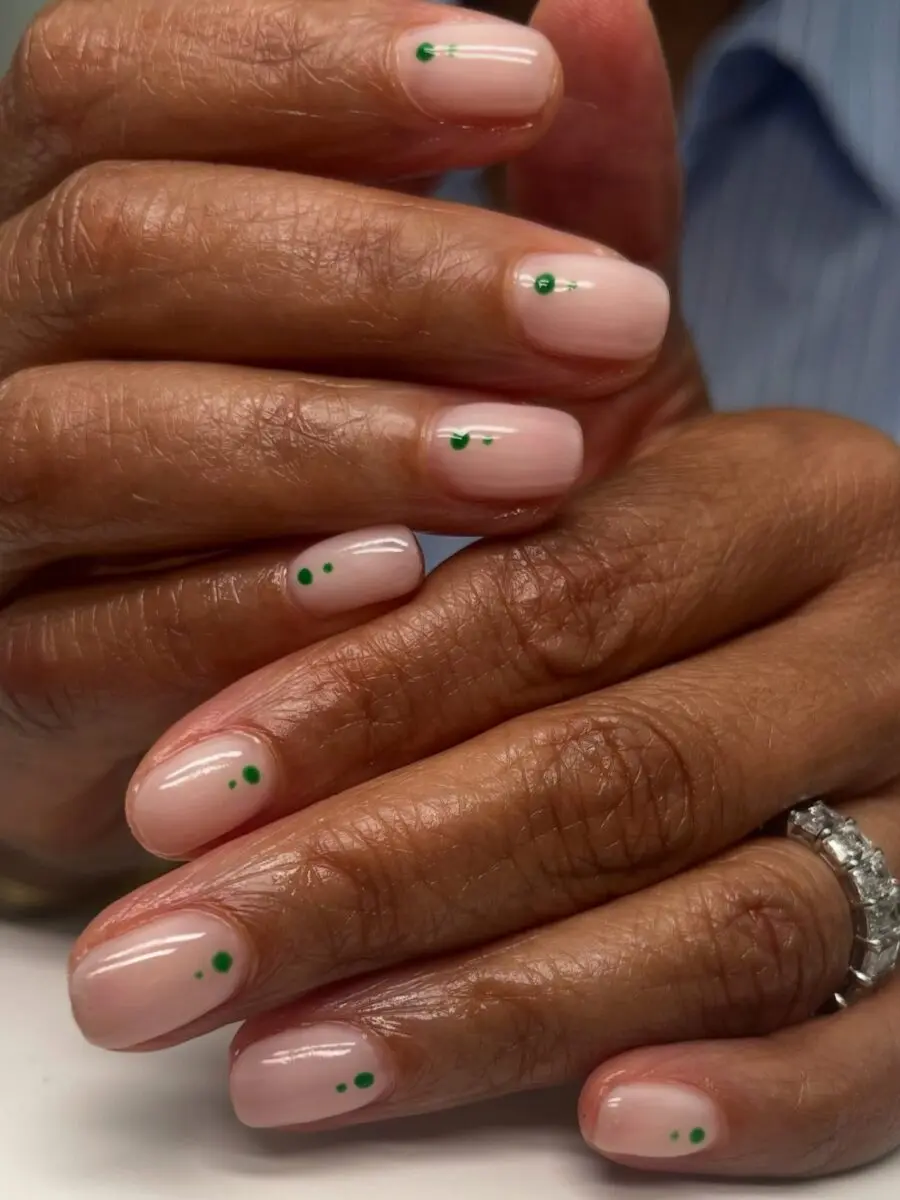 Chic minimalist nails with green accents