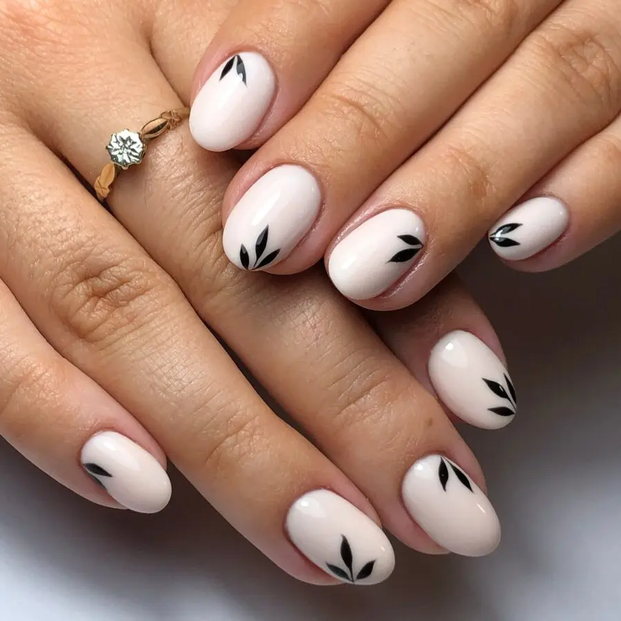 Chic minimalist nails with leaf accents