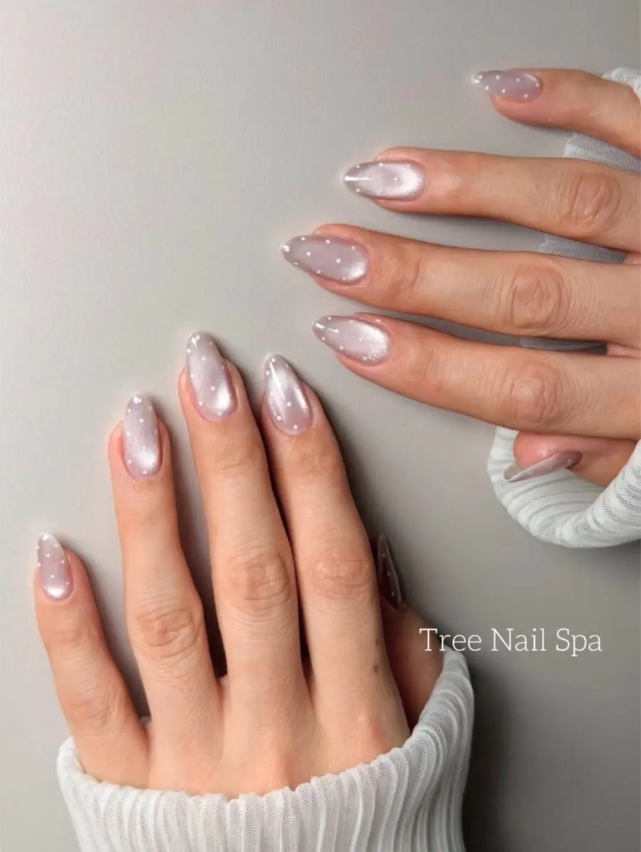Elegant nails with subtle sparkles and sheen