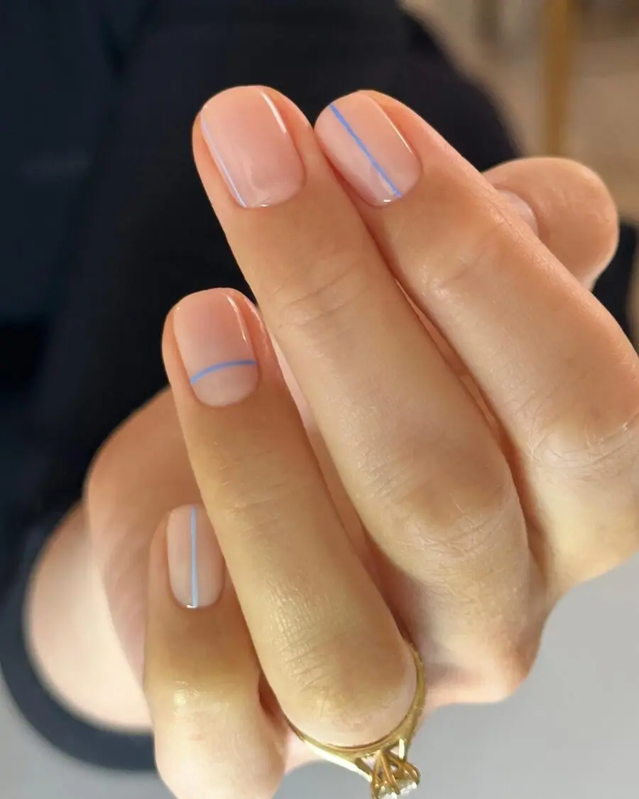 Elegant minimalist nails with subtle blue accents