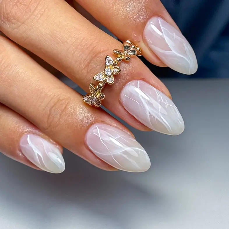 Elegant minimalist nails with butterfly accents