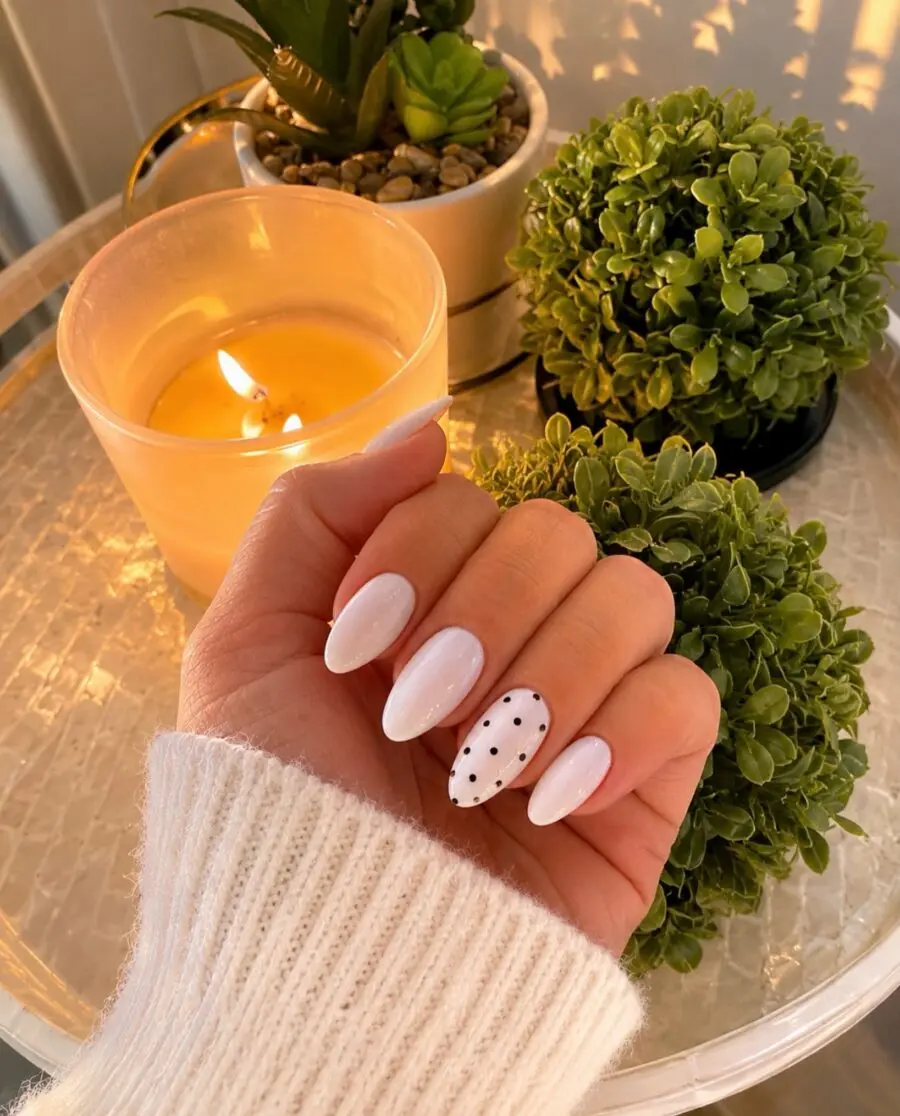 Chic minimalist nails with playful polka dots