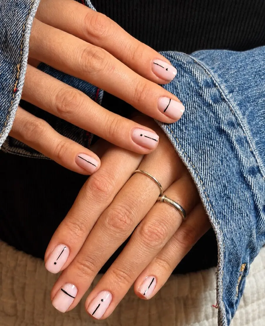 Elegant minimalist nail art in soft hues