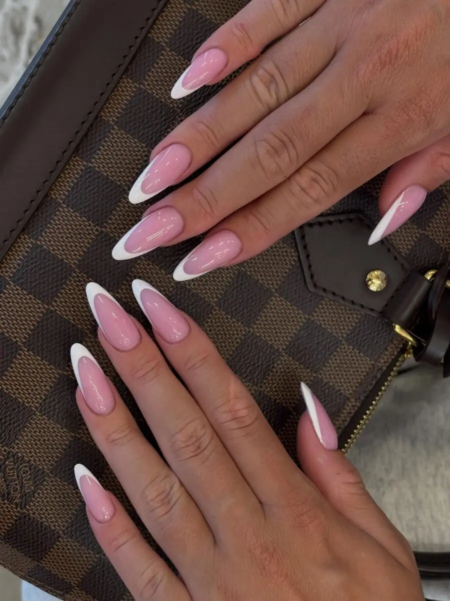 Stylish pink and white French tip nails
