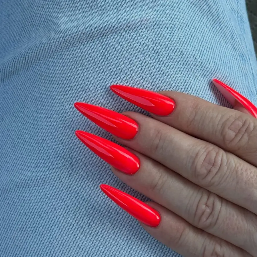 Vibrant red stiletto nails for bold vibes