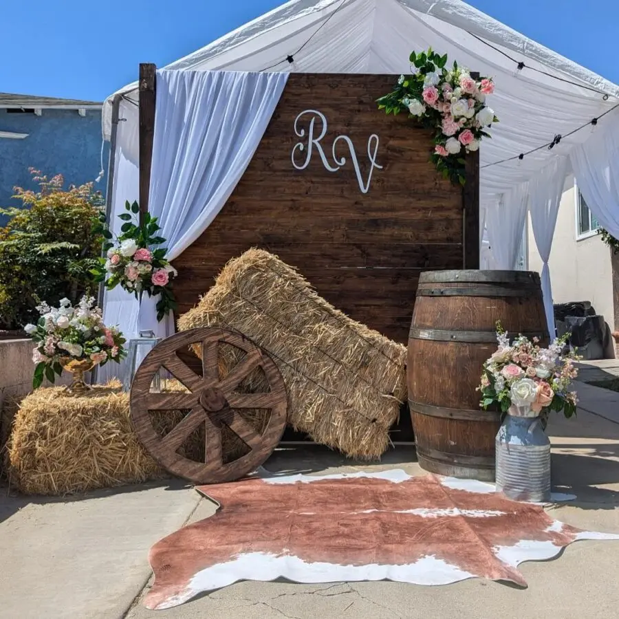 Charming rustic wedding backdrop with floral elegance