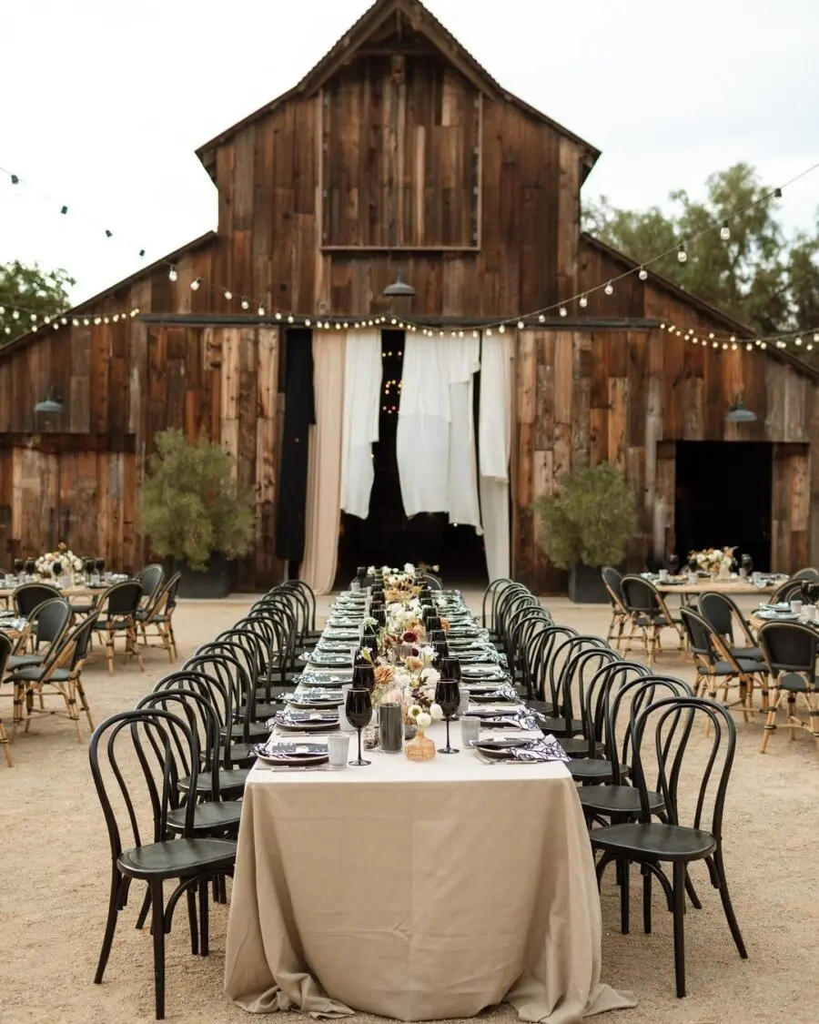 Charming rustic barn wedding table setup