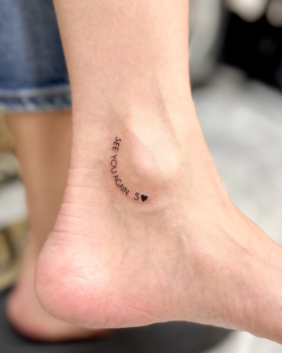 Heartfelt tribute with delicate script tattoo