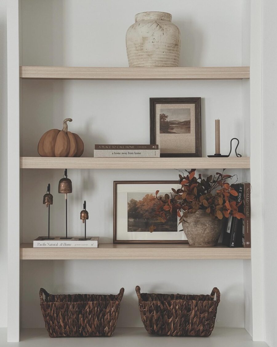 Warm and inviting shelf decor arrangement