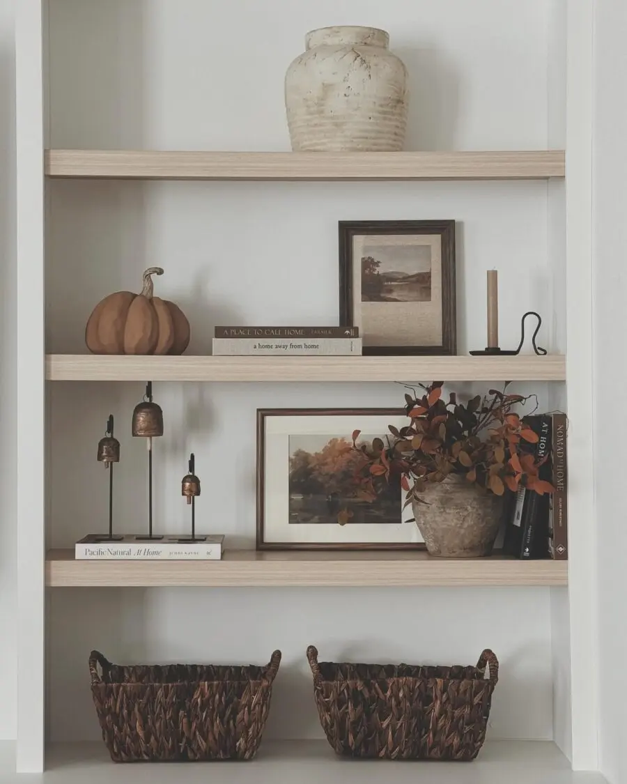 Warm and inviting shelf decor arrangement
