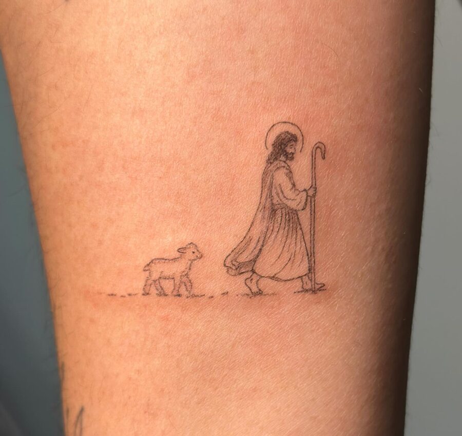 Minimalistic shepherd and sheep tattoo design