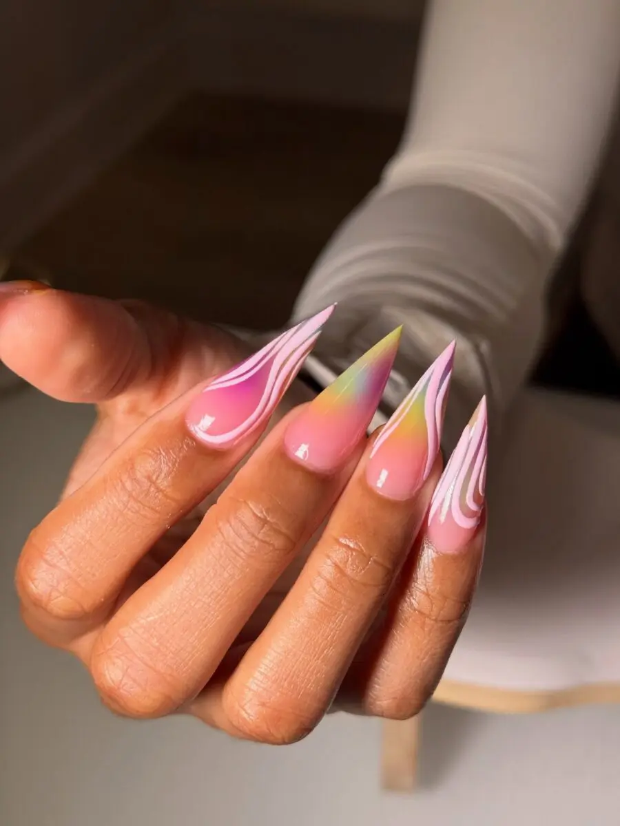 Stunning stiletto nails with vibrant swirl art