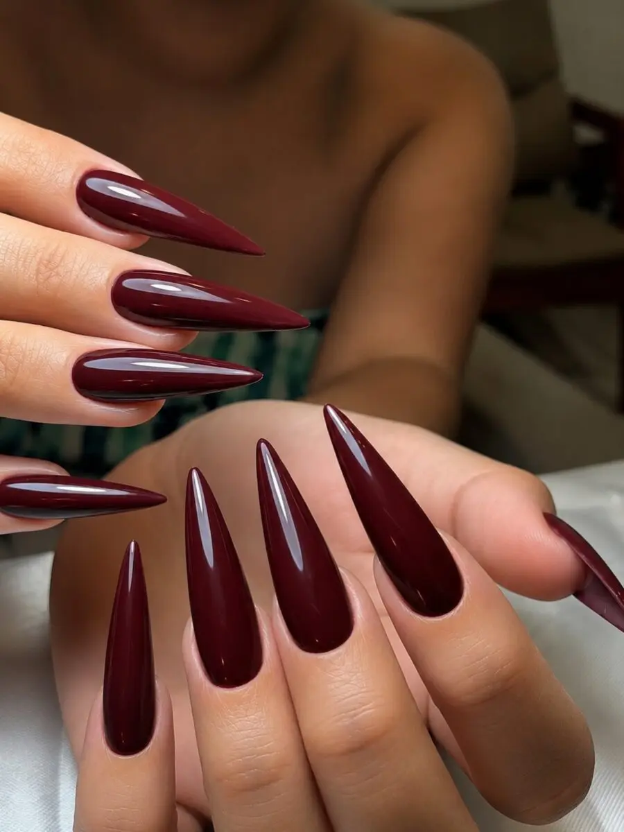 Stylish Burgundy Stiletto Nails in Glossy Finish