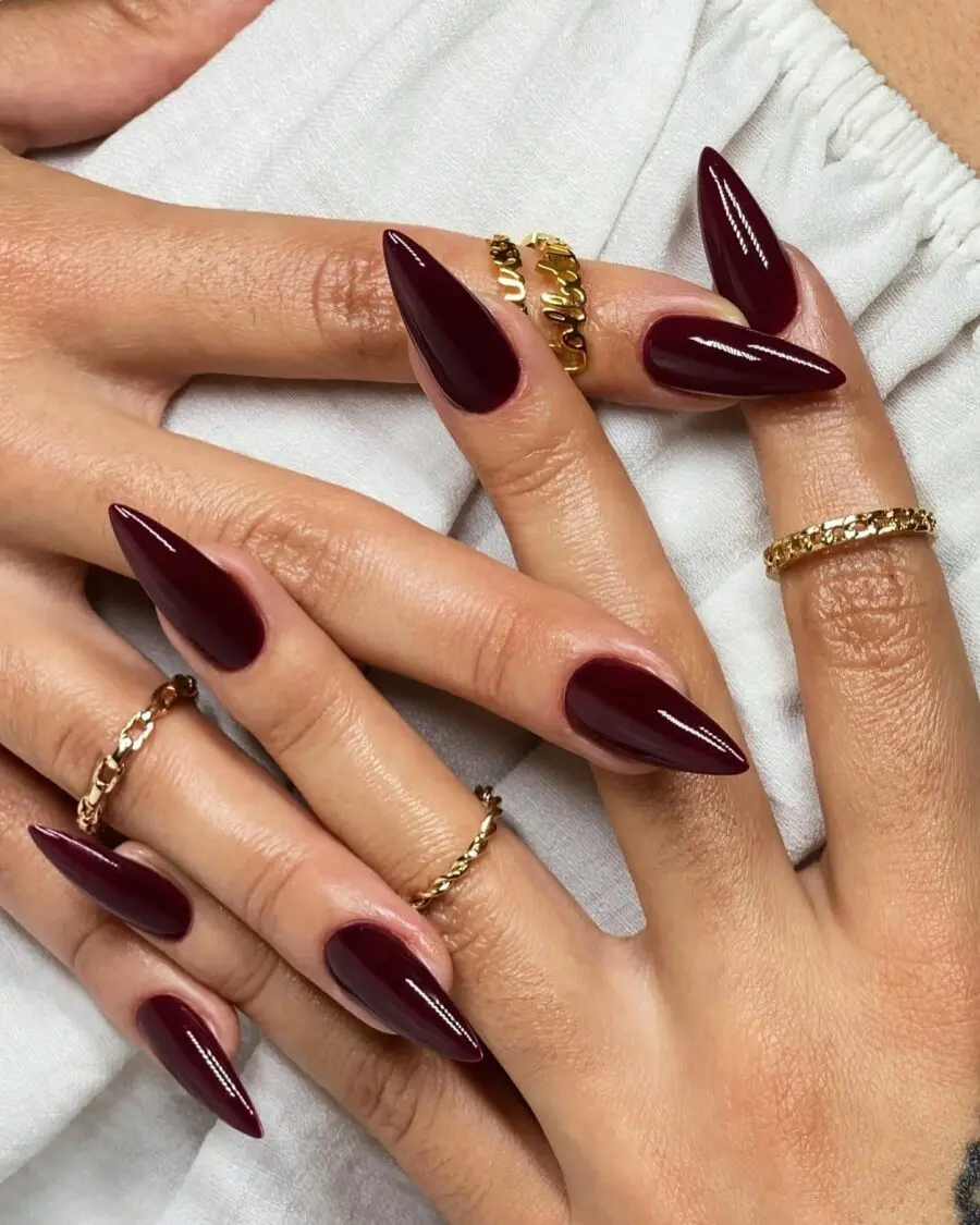 Chic Burgundy Stiletto Nails with Golden Rings