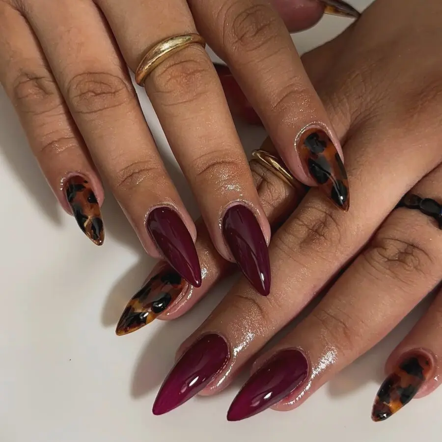 Unique Stiletto Nails with Bold Burgundy Tips