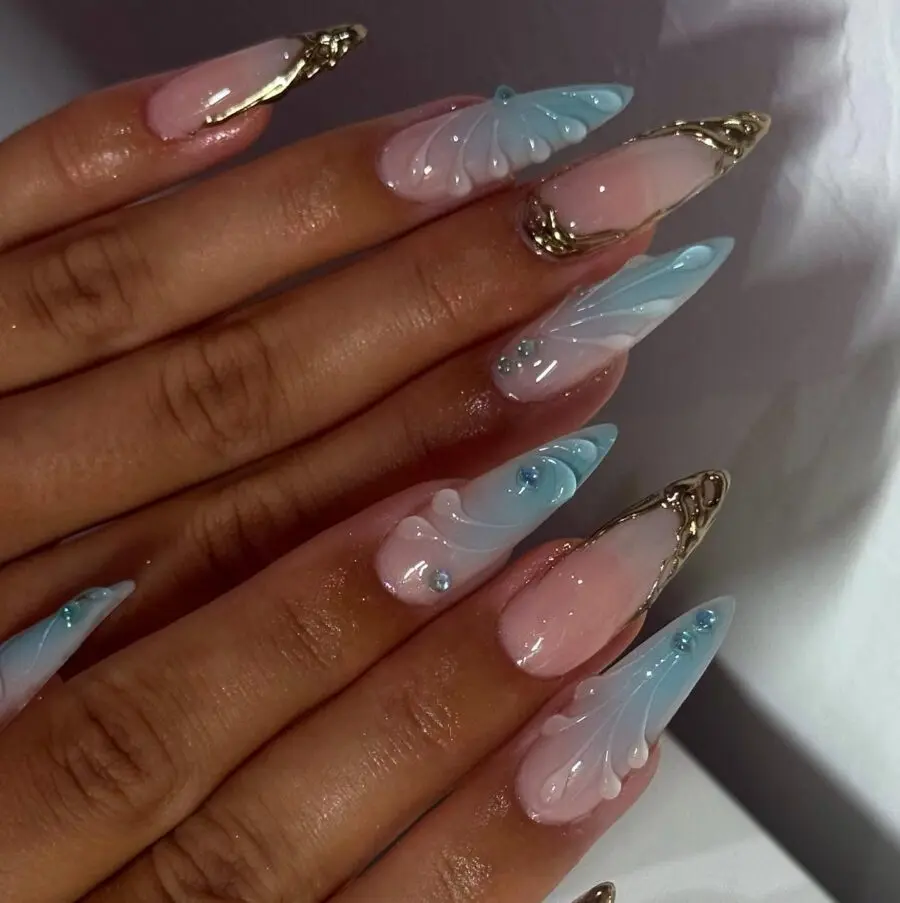 Elegant stiletto nails with butterfly charm