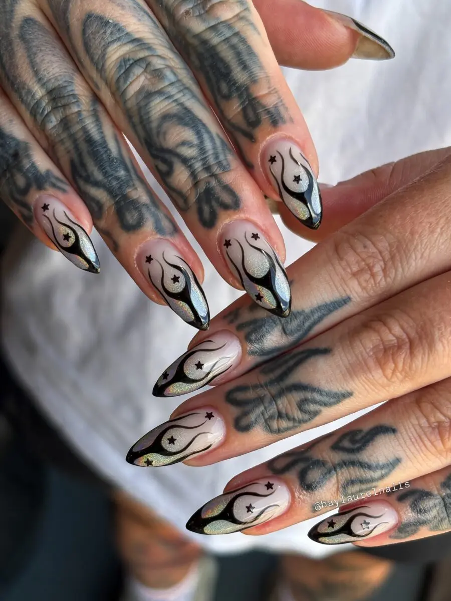 Stunning stiletto nails with celestial designs