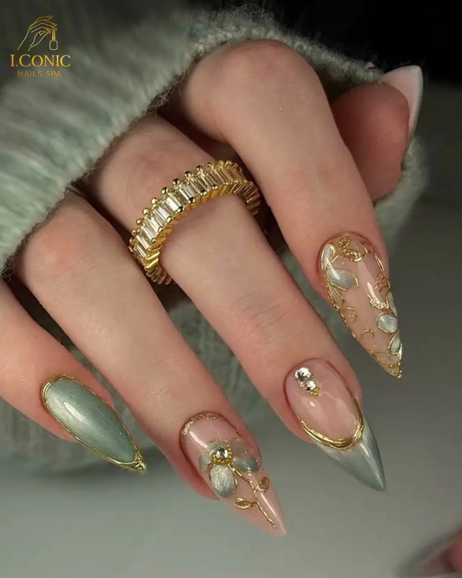 Exquisite stiletto nails with elegant gold accents