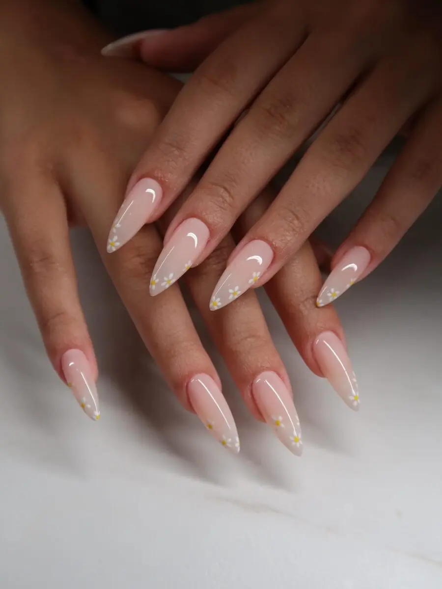 Elegant stiletto nails with floral accents