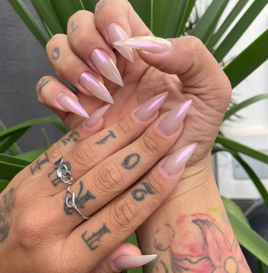 Elegant pink stiletto nails with feminine accents