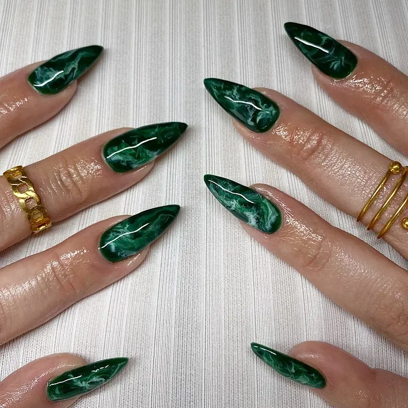 Elegant green marble stiletto nails for glam