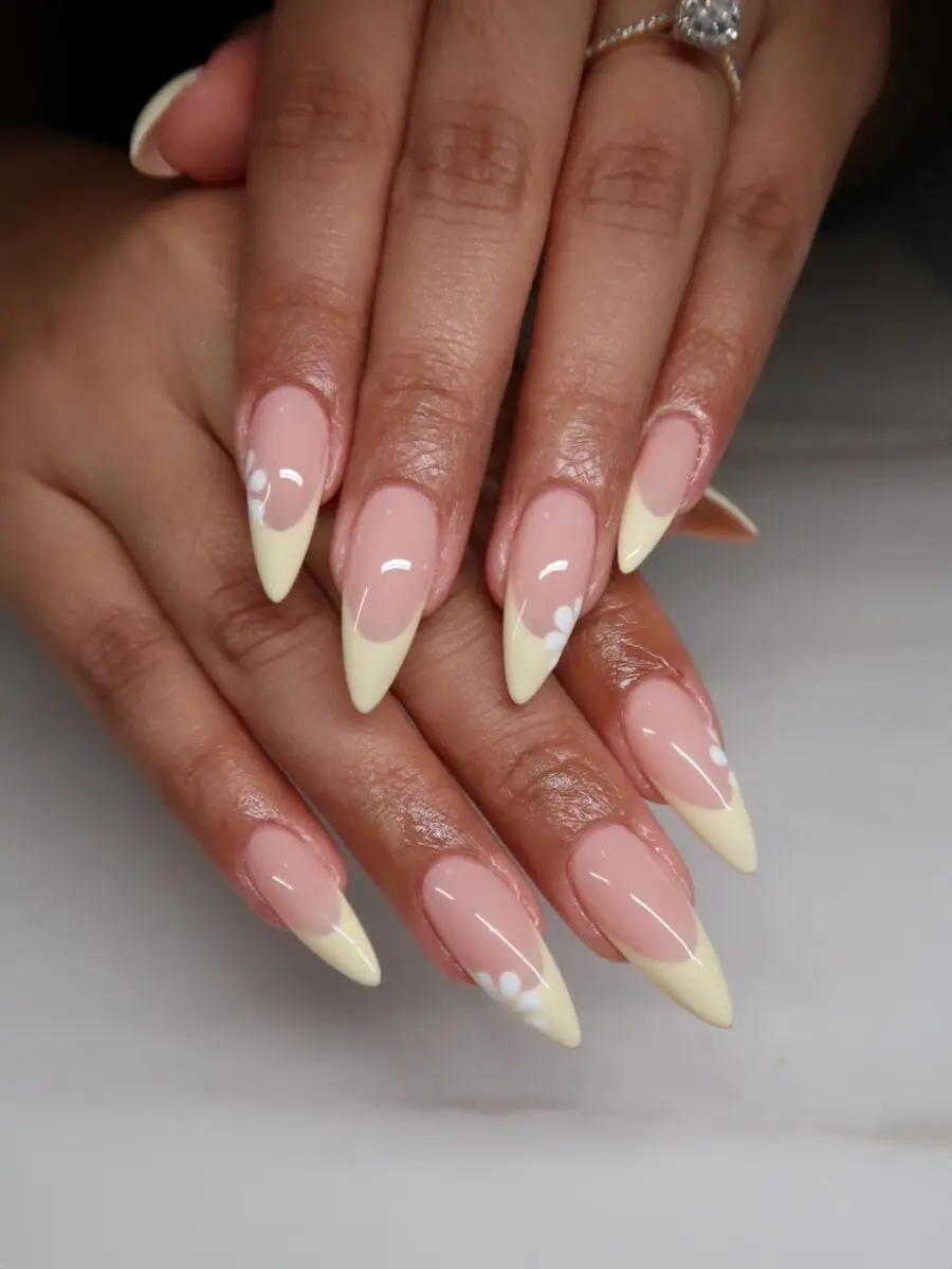 Elegant stiletto nails with soft yellow tips