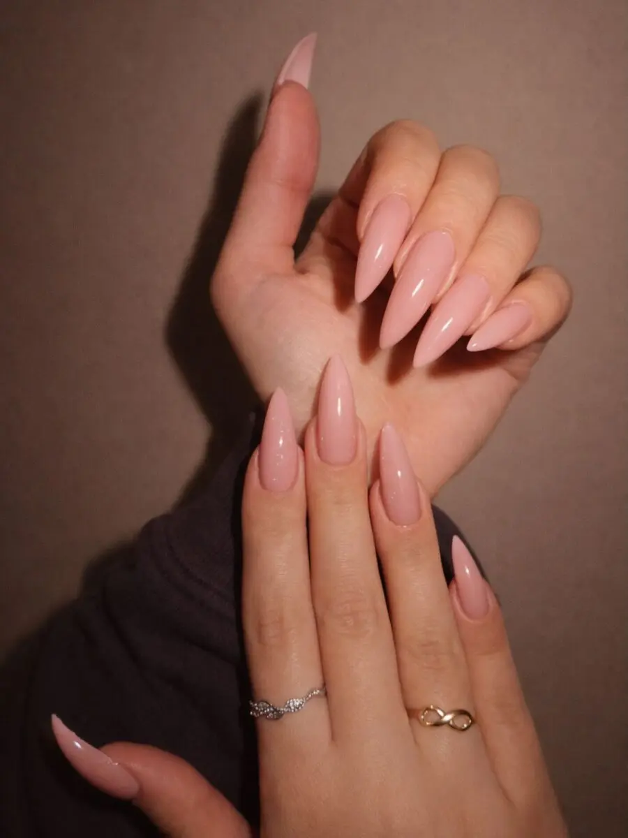 Elegant pink stiletto nails for chic vibes.