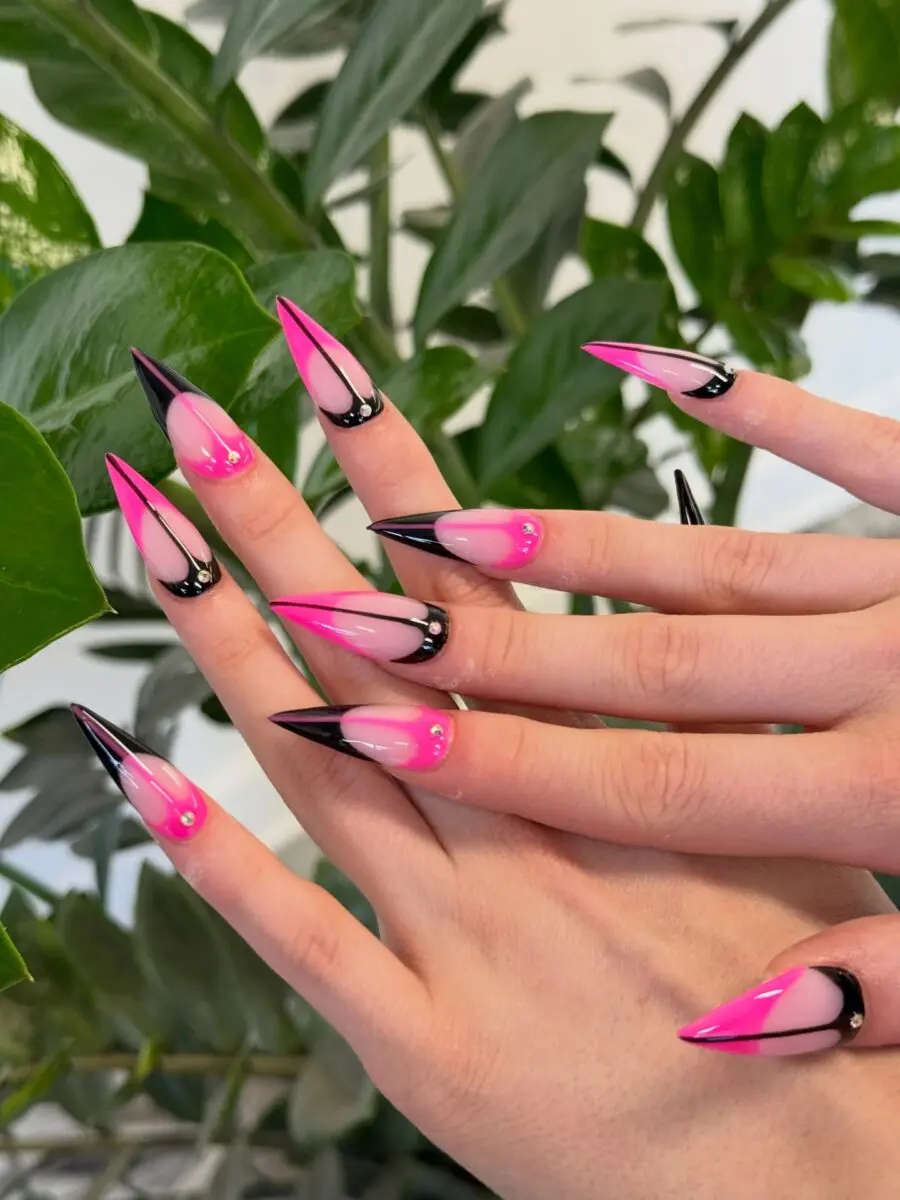Bold pink and black stiletto nail art