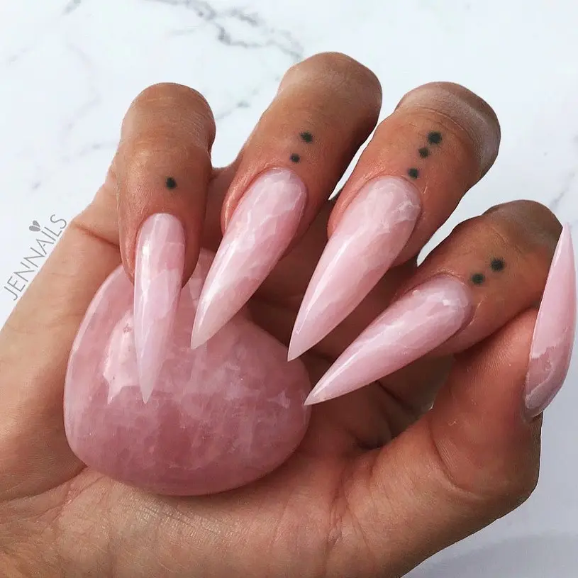 Chic pink marbled stiletto nail design