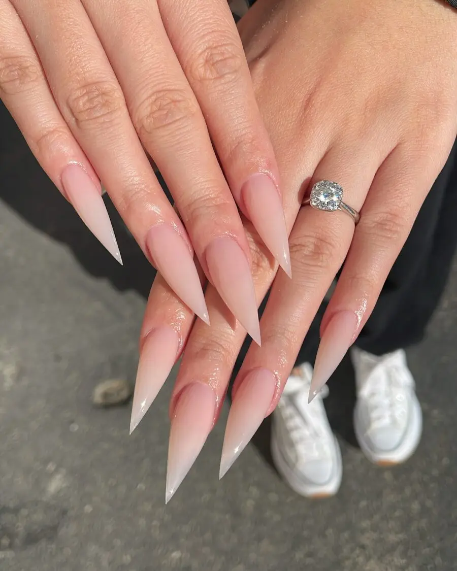 Sleek, pointed stiletto nails with ombre finish